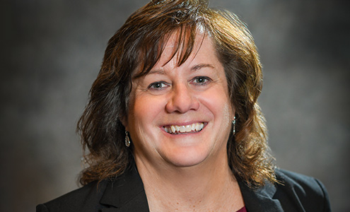 headshot of Gina Dembeck, the Vice President of Human Resources at Roland Park Place senior living community in Baltimore