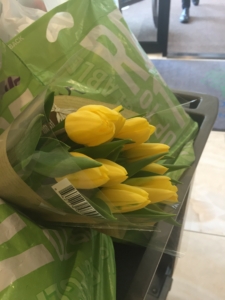 Yellow Tulips on front desk cart