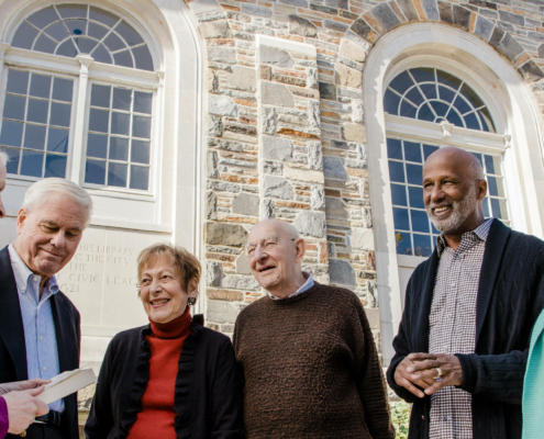 group of 6 senior living residents standing outside the Enoch Pratt Free Library in Baltimore