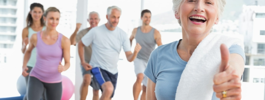 Image of a group of older adults in a fitness class.