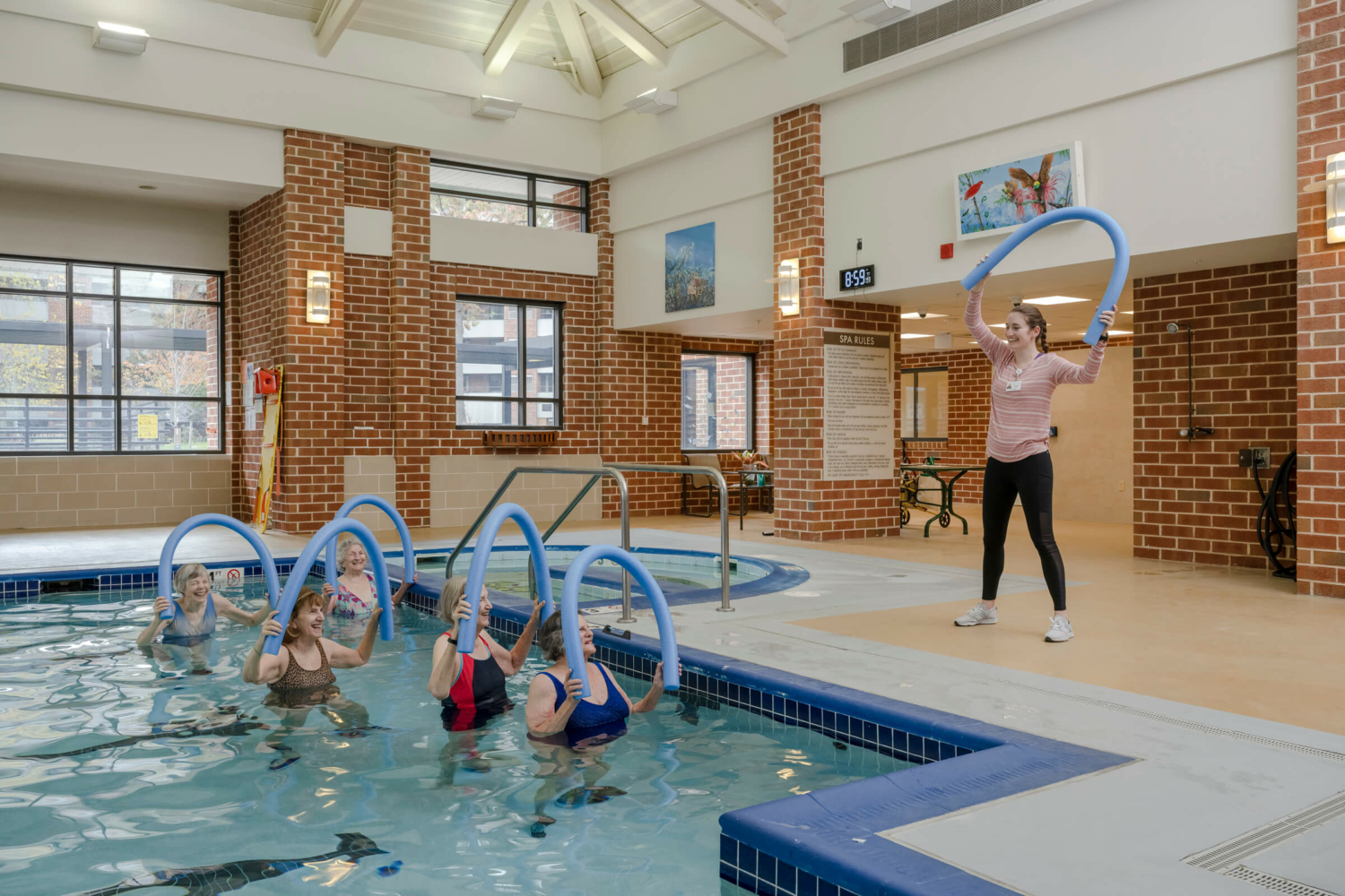 photo of a group of seniors enjoying a water aerobics class at Roland Park Place, a Baltimore senior living community
