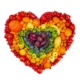 Image of a rainbow-colored heart comprised of colorful fruits and vegetables.