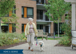 Mimi (resident) and George (her dog) taking a walk through Roland Park Place